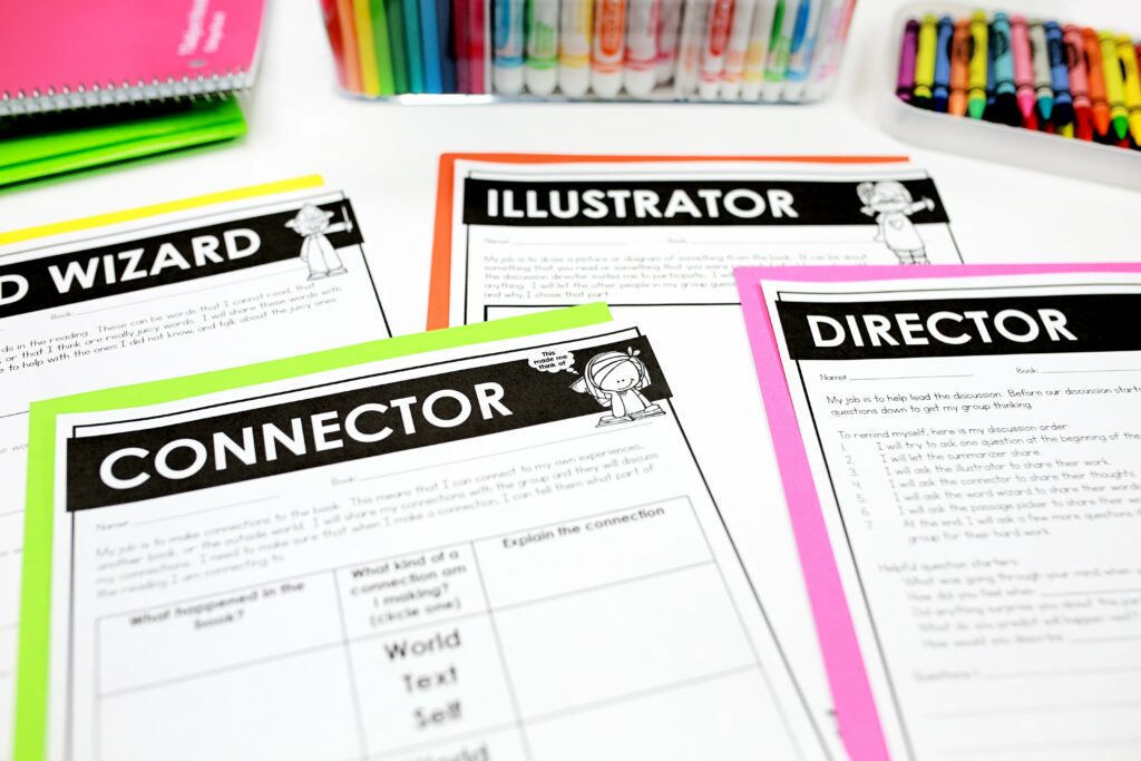 Literature Circles role worksheets. Each role has a different recording page to keep track of their work and responses. Each page also has a summary of the role's responsibilities at the top. Shown are the word wizard, connector, illustrator and director.