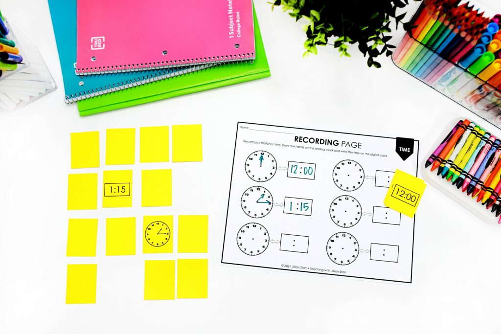 Time to the minute memory match with two cards flipped over. One is a clock face and the other is its digital match. There is a recording page next to it for accountability.