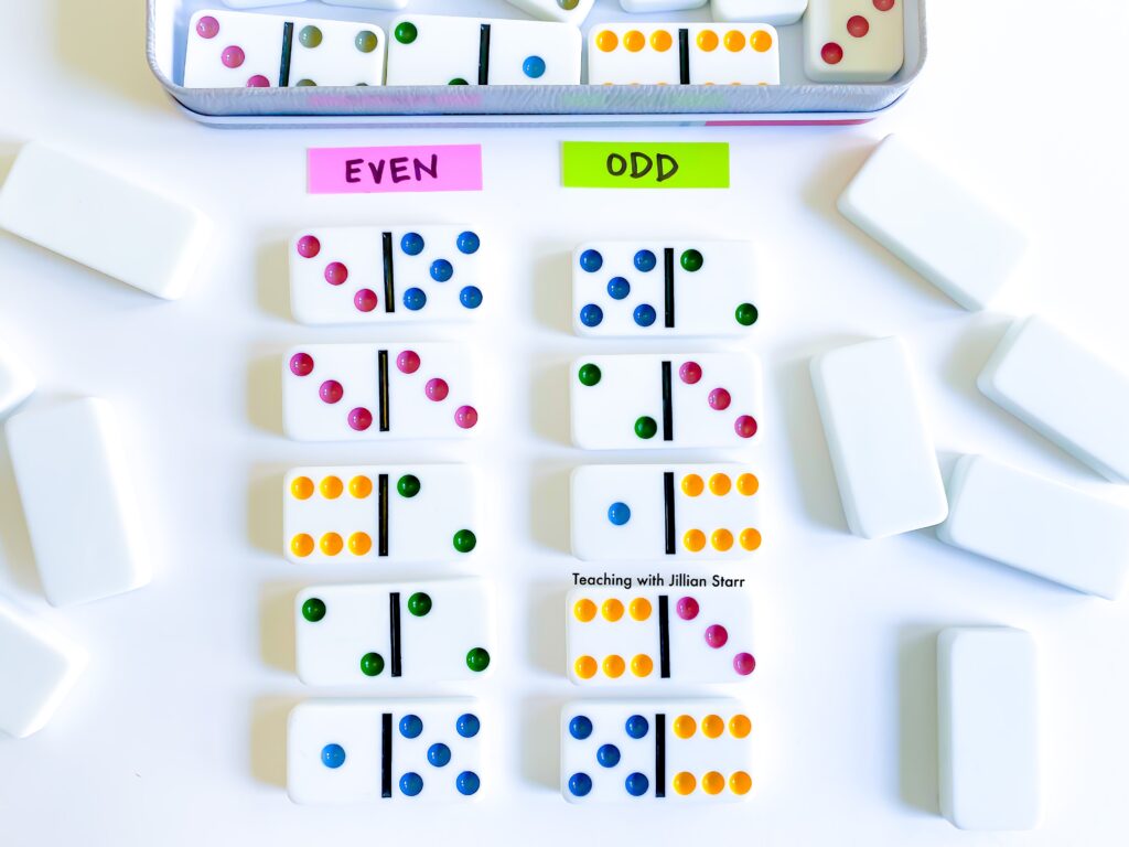 Domino addition odd and even sorts, where students add the two sides of the domino and then sort their sums into piles of odd and even.