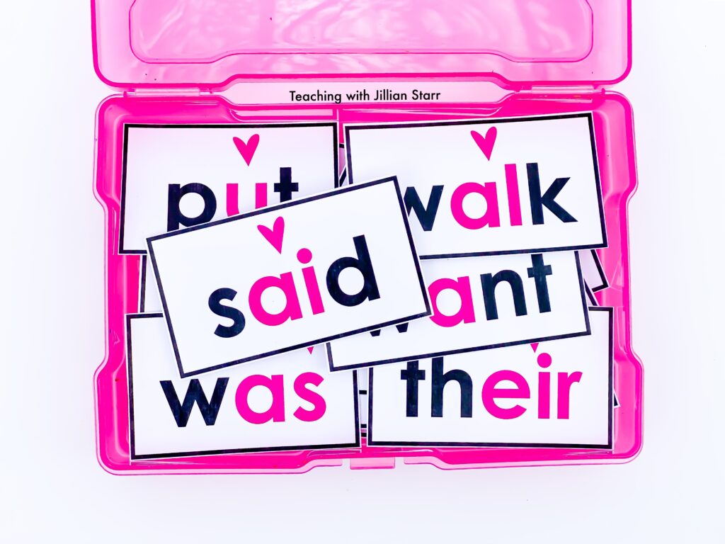 Photo of Heart Word Cards that include a pink heart above each of the high frequency words where they do not follow a phonics pattern.
